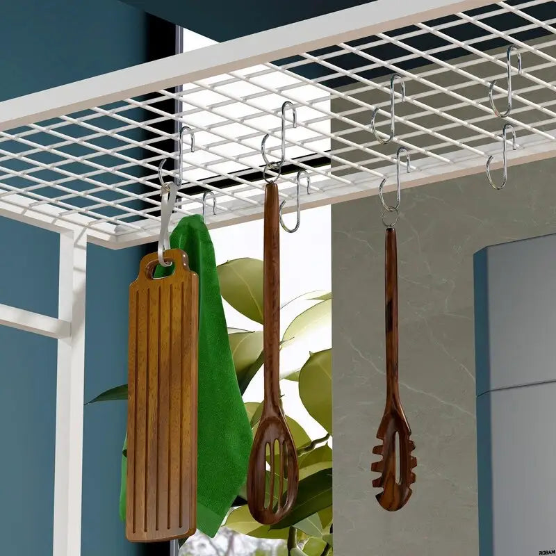 Isla de cocina con panel abatible plegable, estantes y cajones de armario, y ganchos