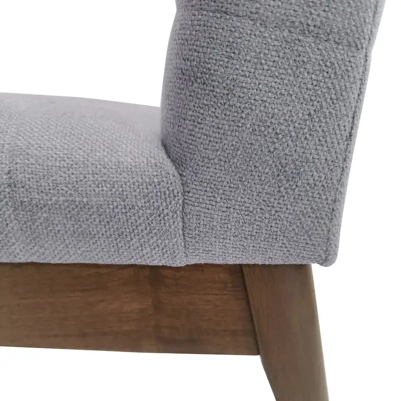 Silla de comedor tapizada moderna de estilo mid-century con costuras acanaladas y patas de madera de nogal