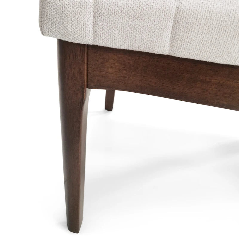 Silla de comedor tapizada moderna de estilo mid-century con costuras acanaladas y patas de madera de nogal