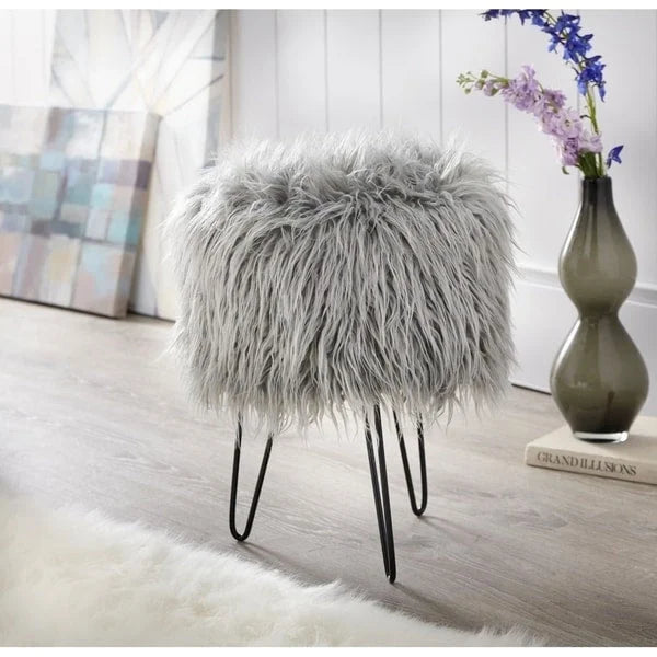 Taburete decorativo redondo de piel sintética suave con patas negras en forma de horquilla