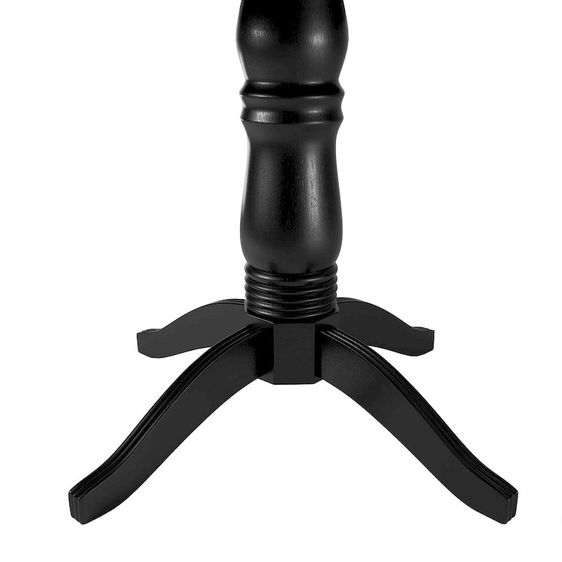 Mesa de comedor redonda clásica negra de caucho con base de pedestal torneada
