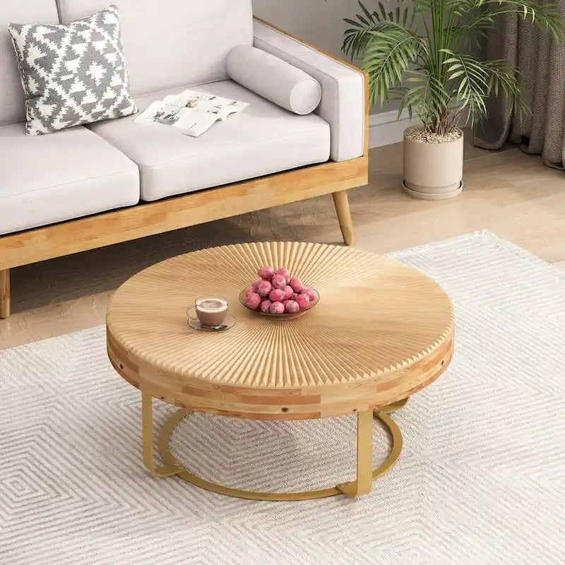 Mesa de centro redonda moderna con patrón de tallado en madera y patas de metal